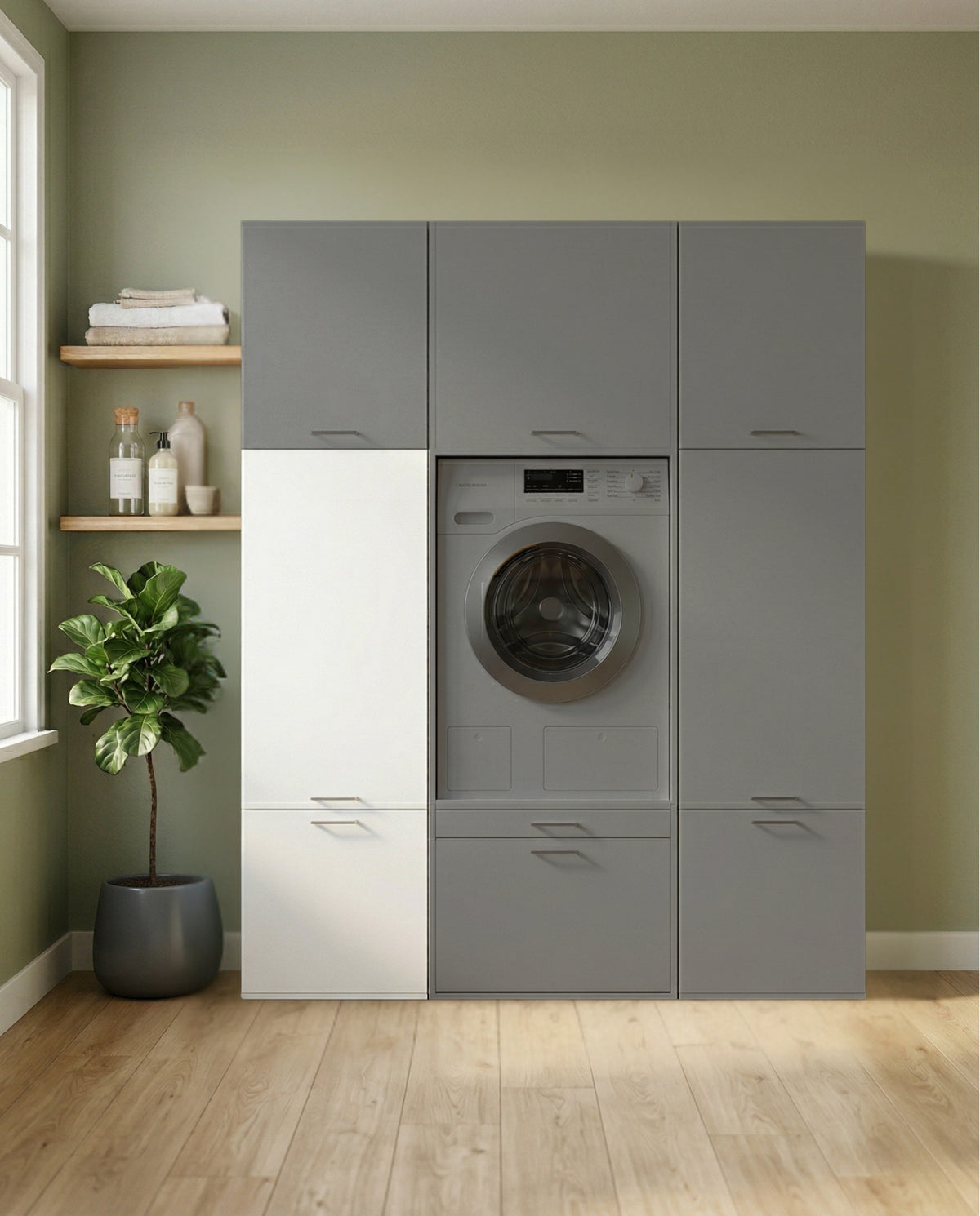 Tall grey and white modular storage cabinet with built-in front-loading washing machine in a light green room.