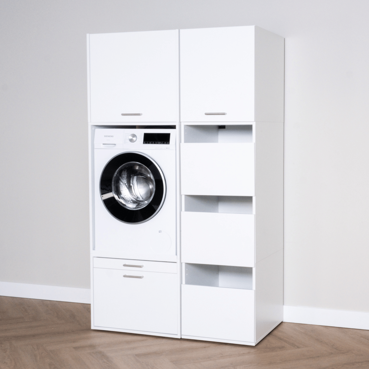 White modern laundry storage cabinet with built-in front-load washing machine and open shelves.