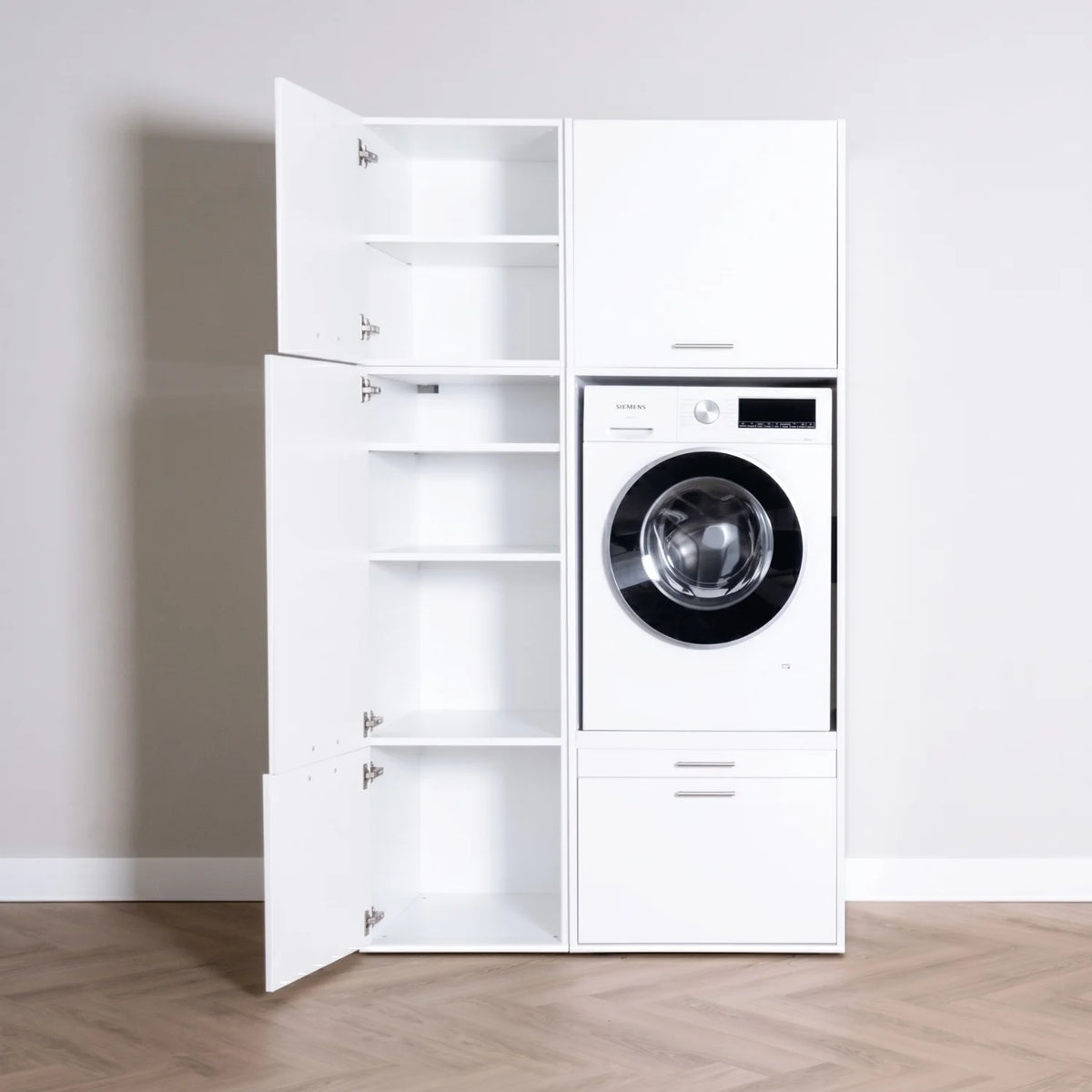 White modern laundry cabinet with open shelving and front-loading washing machine compartment.